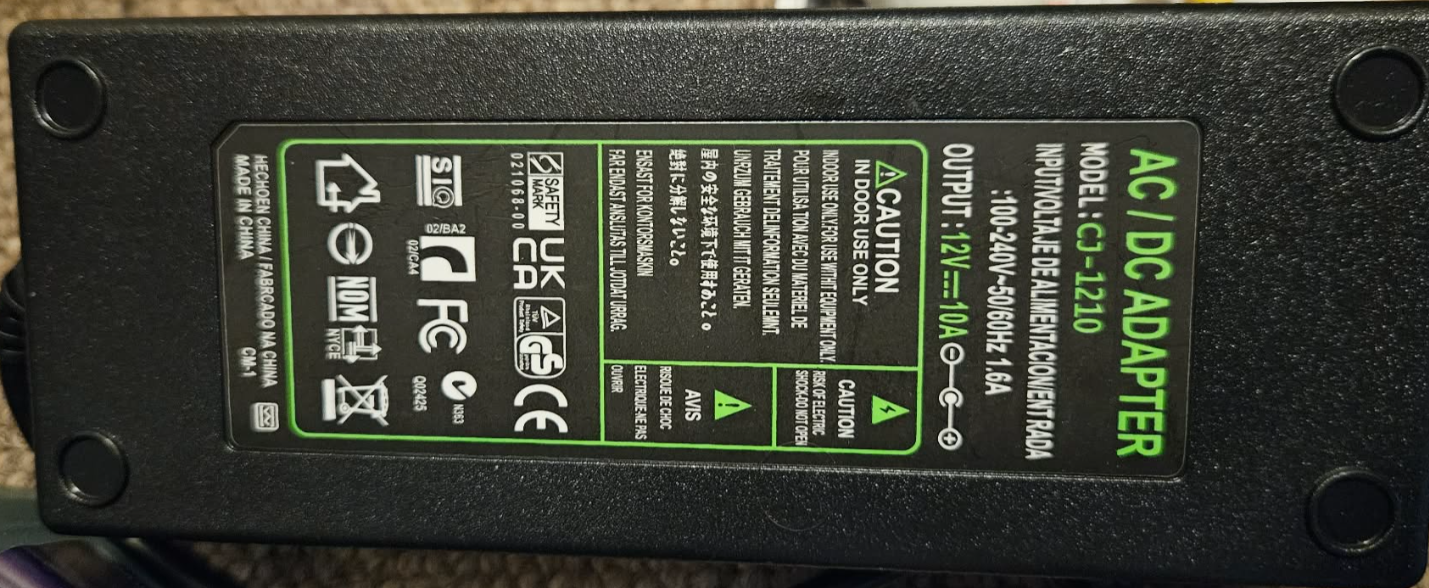 Label on the tested 12 volt 10 amp power supply
